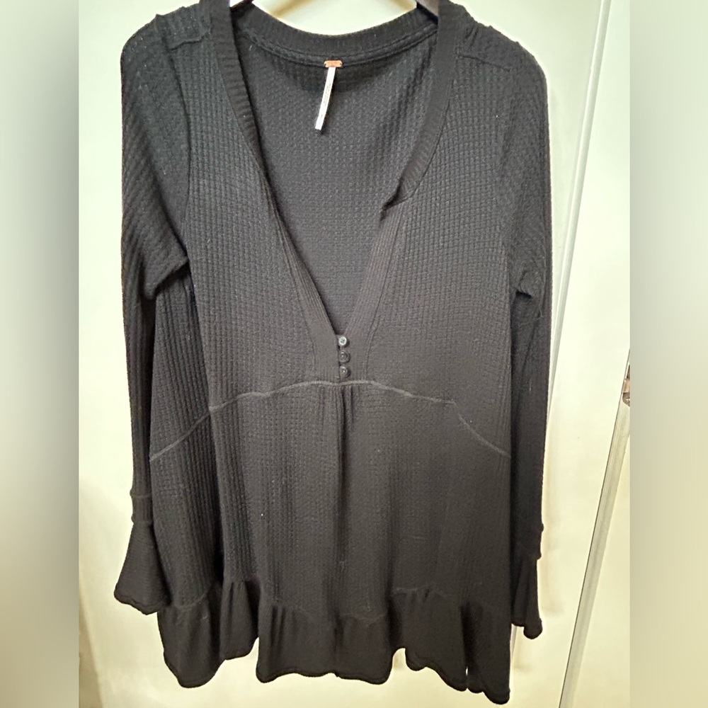 Women’s Free People black baby doll shirt.
